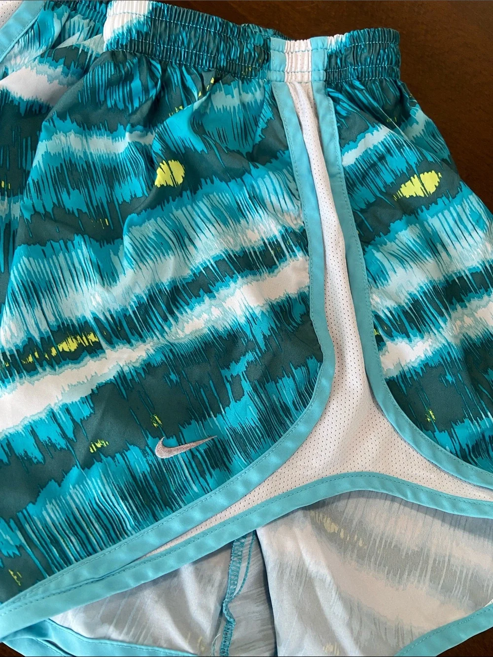 Nike Teal, White and Yellow Patterned Women’s Athletic Shorts. Size M